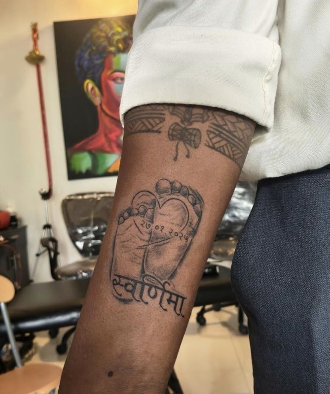 Anmol tattoo