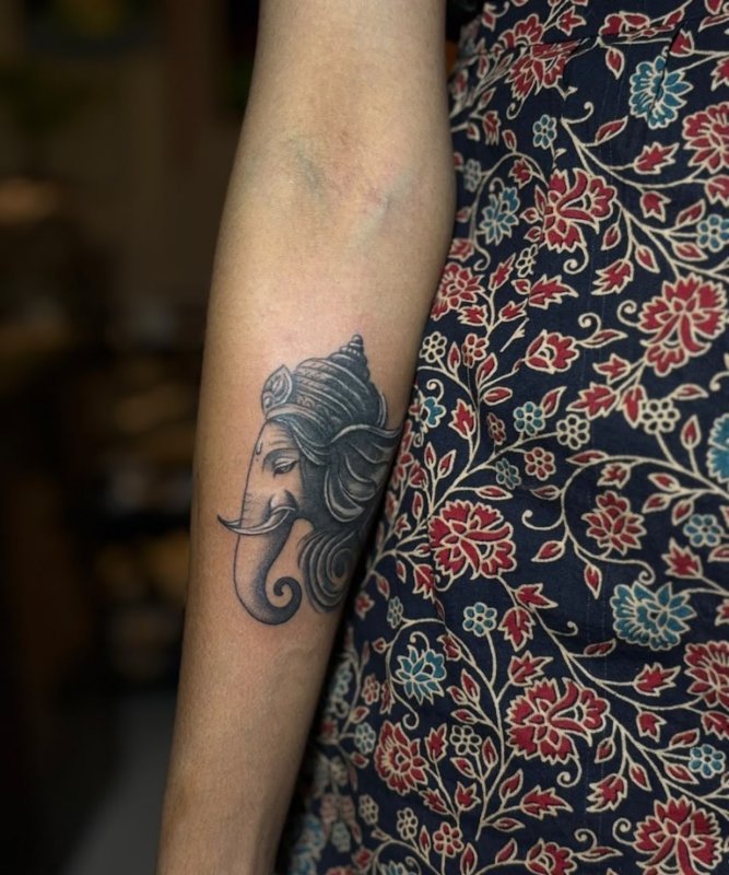 Anmol tattoo